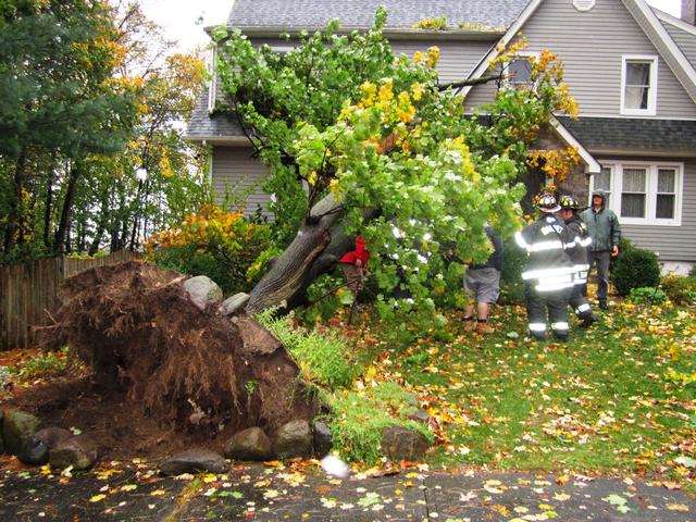 As we all lived through the Perfect Storm Sandy the Nanuet Fire Department answered the calls for help. Over 80 calls in  24 hours. Here are a few from Monday evening.    Photo By Vincent P. Tuzzolino . 10-29-2012